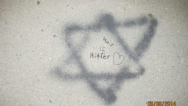  An image of some of the graffiti found on a Spring Valley sidewalk.