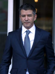 Former Uber CEO Travis Kalanick leaves the Phillip Burton Federal Building on day three of the dispute between Waymo and Uber Technologies on Feb. 7 in San Francisco.