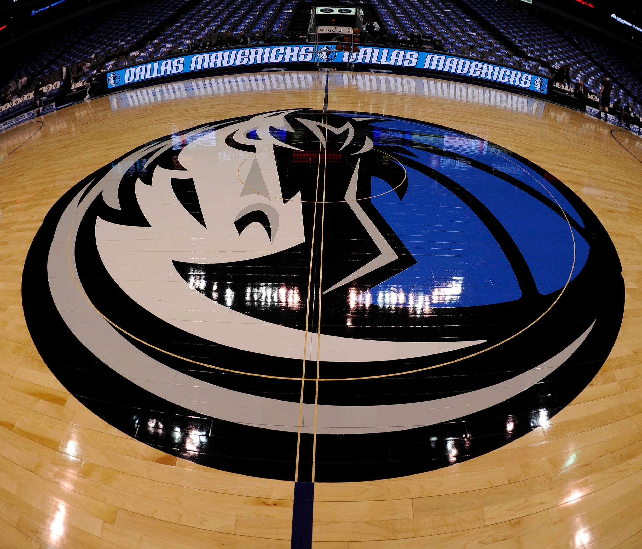 A general view of the Dallas Mavericks logo at center court before the game between the Mavericks and the Sacramento Kings at the American Airlines Center.