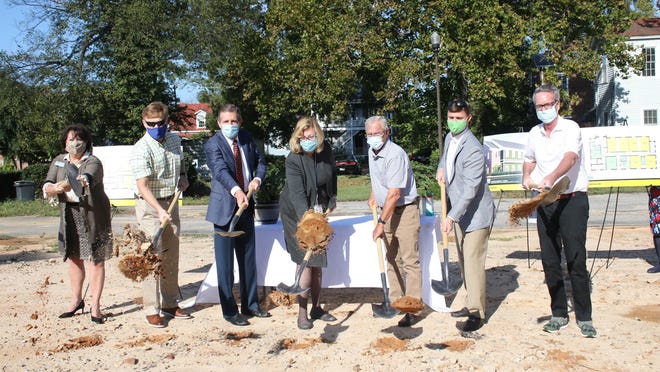 (From left to right) President and CEO of Augusta Chamger of Commerce Sue Parr, Heritage Academy project manager Jeff Westergreen, Heritage board chair Eric Smith, Heritage executive director/founder Linda Tucciarone, Heritage founder Phin Hitchcock, architect Nick Dickinson, Jr., and Heritage supporter Clay Boardman break ground for Heritage Academy's new early learning academy Wednesday. Oct. 14.