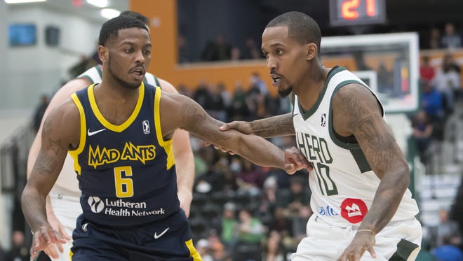 Brandon Jennings (right) has been playing with the Milwaukee Bucks' G League affiliate, the Wisconsin Herd. On Sunday morning, Jennings signed a 10-day contract with the Bucks.