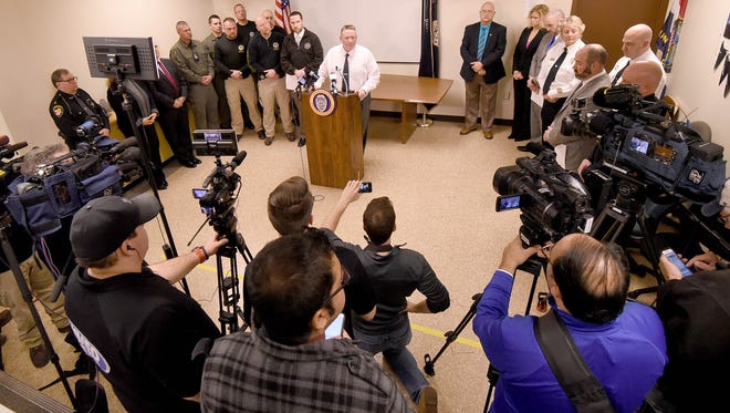 Mansfield Police Chief Ken Coontz, surrounded by area law enforcement, holds a press conference for media from around the state of Ohio on Thursday regarding the murder of Kaitlyn Carroll-Peak by Dakota M. Steagall.