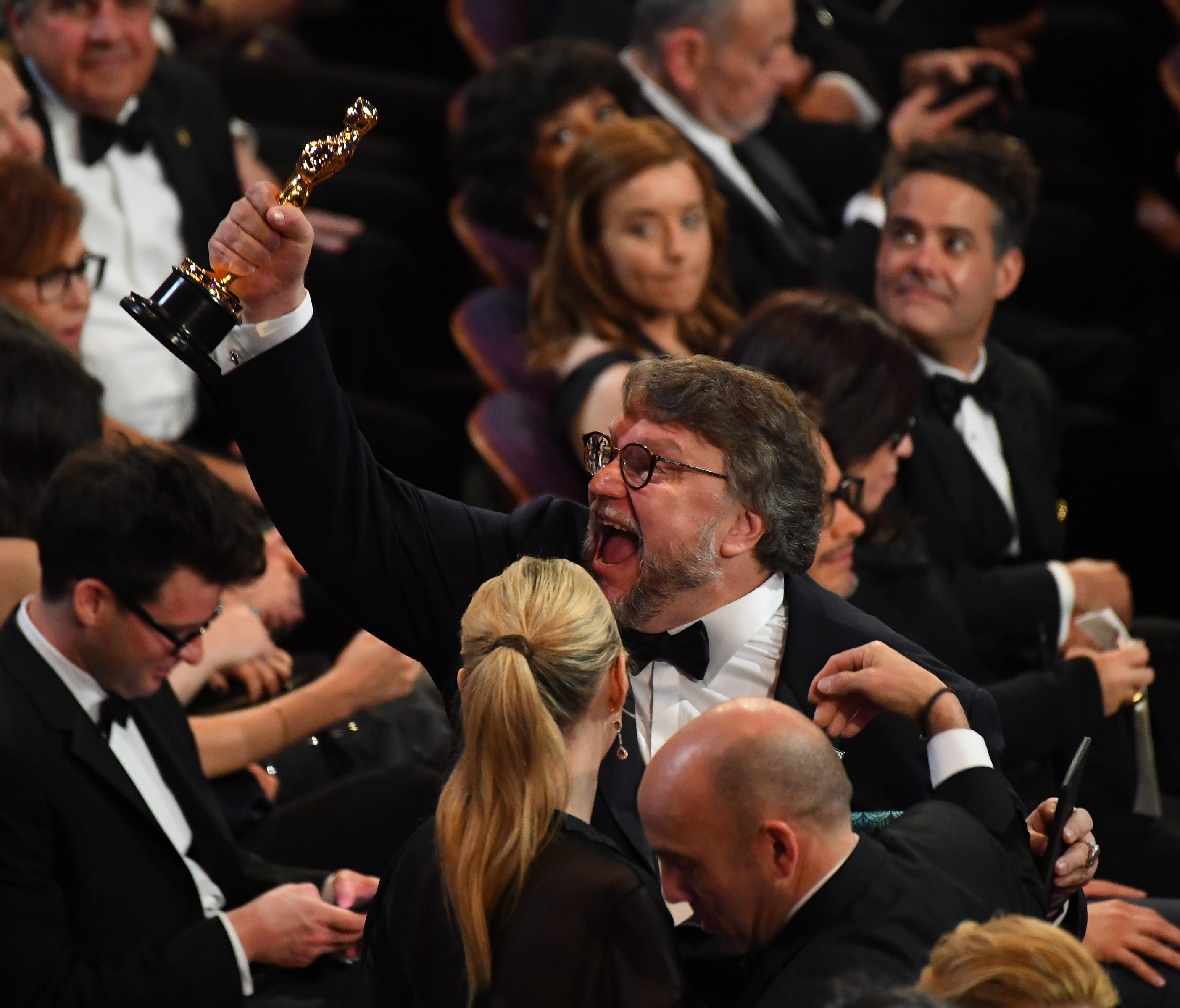 March 4, 2018; Hollywood, CA, USA; Guillermo del Toro celebrates after winning the Oscar for achievement in directing for 