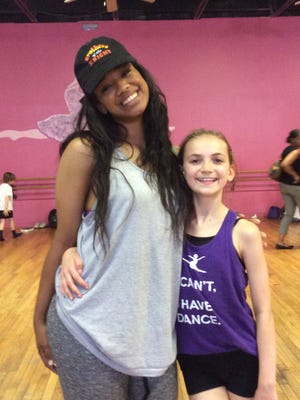 Maggie Northey (right) enjoyed learning routines for “Brothers of the Knight” with Kylie Jefferson, master dance instructor from the Debbie Allen Dance Academy.