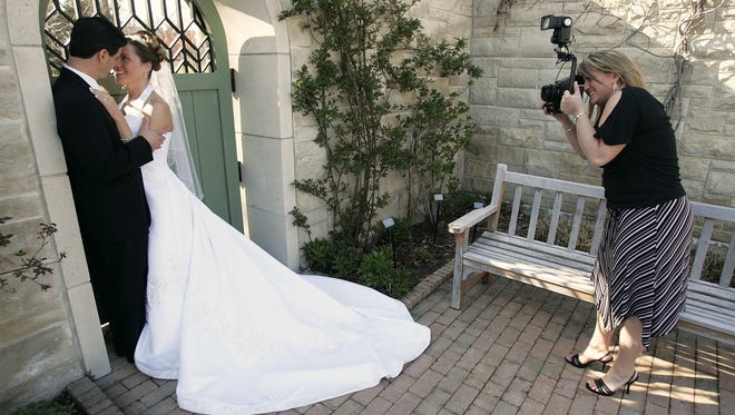 Couples need to decide when and if they will allow guests to take smartphone photos during their wedding.