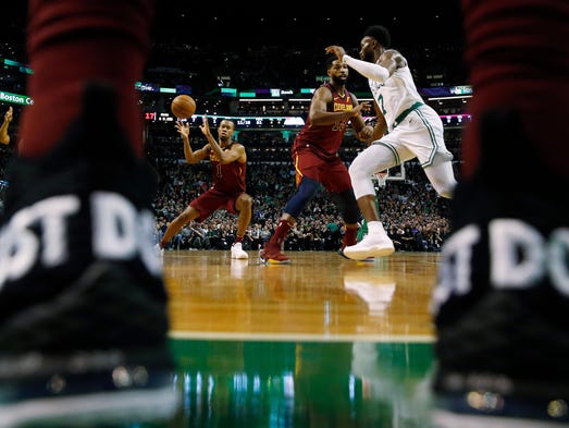May 13: Rodney Hood takes a pass as Jaylen Brown looks