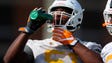 Drew Richmond (51) drinks water during Tennessee Volunteers