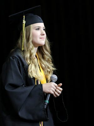 Hannah Pruett takes the stage to sing "The Climb" by Miley Cyrus during Cascade High School's 66th Annual Commencement on Wednesday, June 1, 2016, at the Salem Armory.