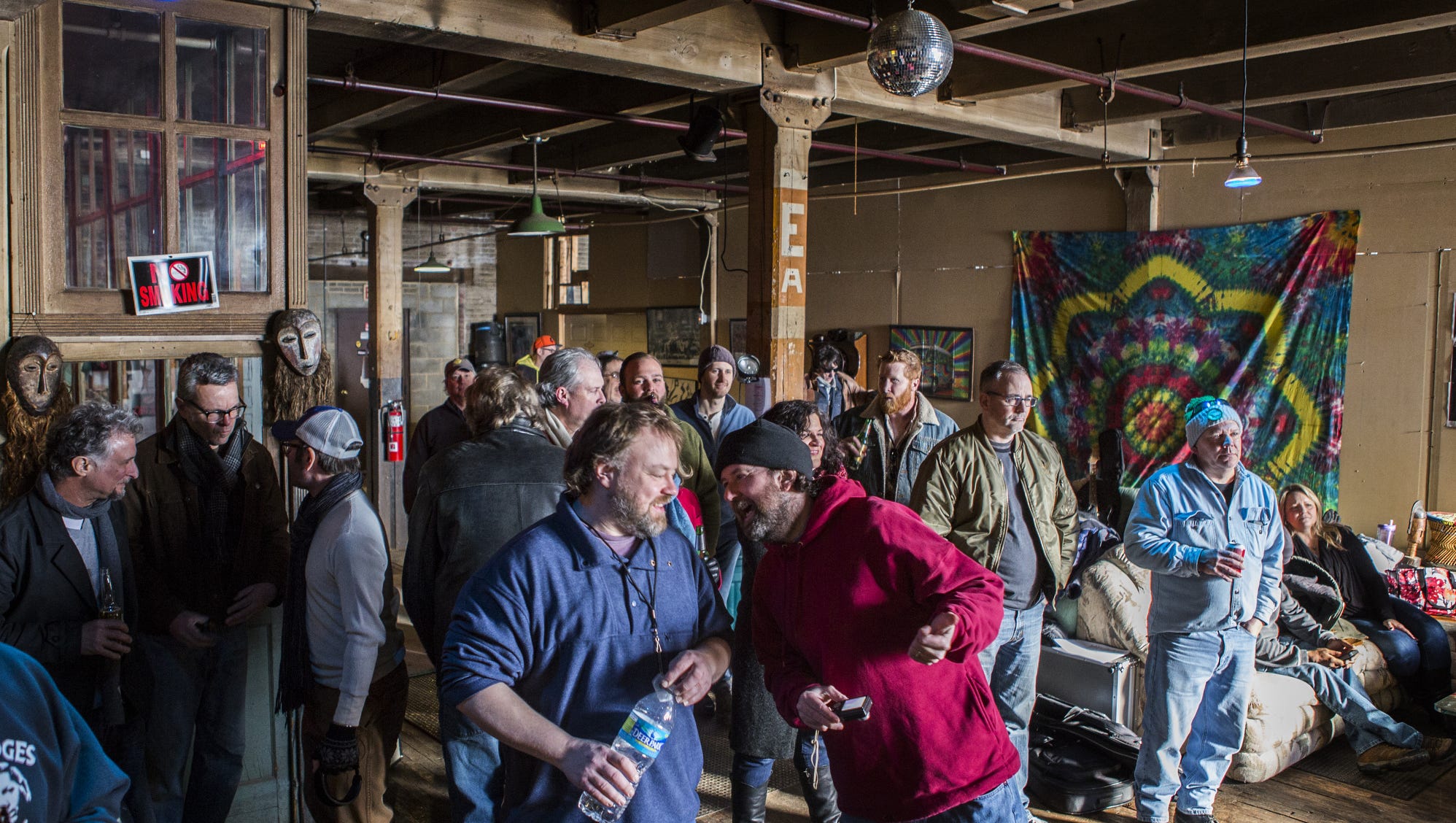 Shine a Light musicians watch rehearsals at a New Castle warehouse last weekend.