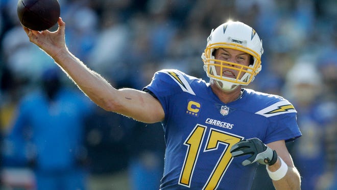 Los Angeles Chargers quarterback Philip Rivers passes against the Cleveland Browns during the first half of an NFL football game Sunday, Dec. 3, 2017, in Carson, Calif. (AP Photo/Jae C. Hong)