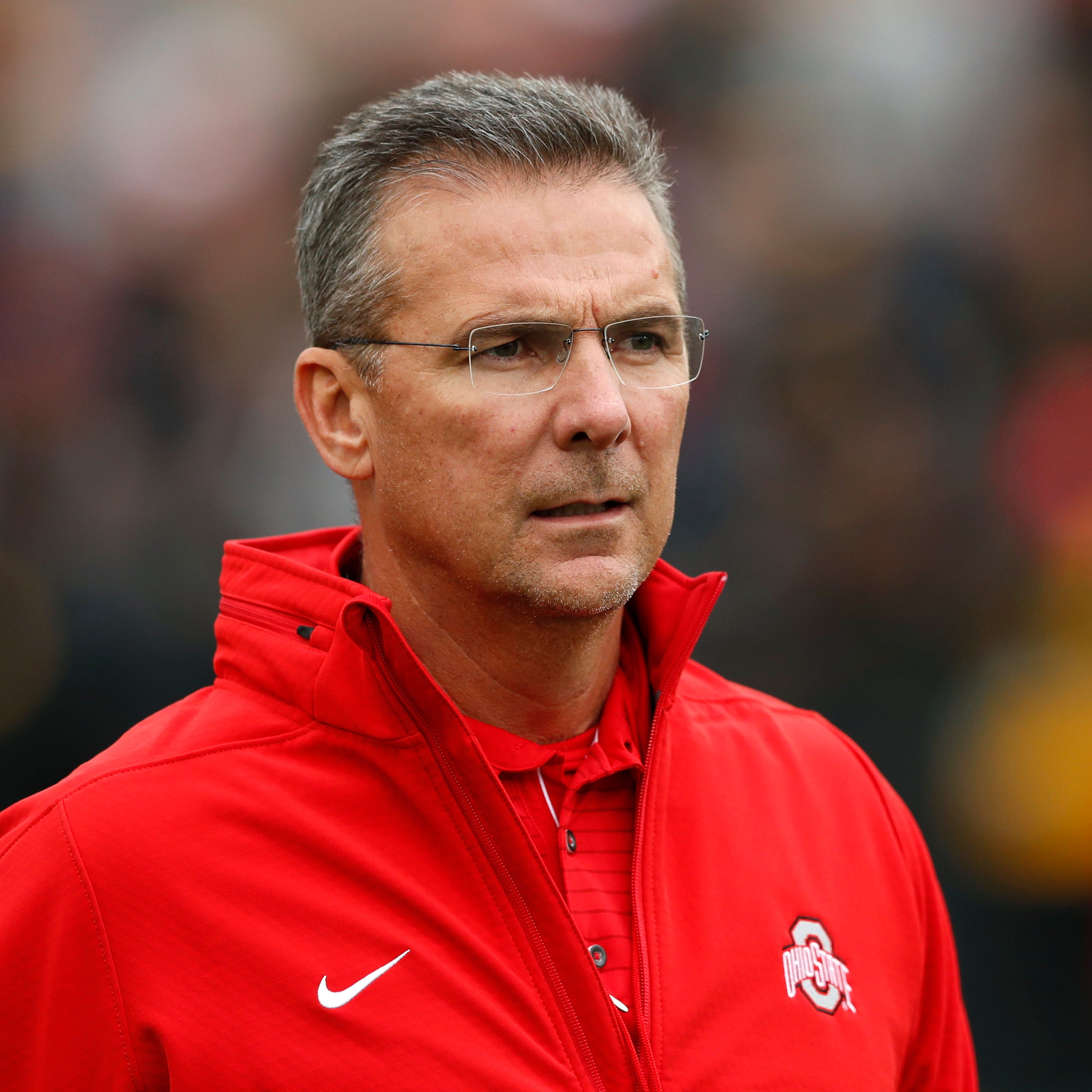 FILE - In this Nov. 4, 2017, file photo, Ohio State head coach Urban Meyer walks on the field before an NCAA college football game against Iowa, in Iowa City, Iowa. Ohio State trustees are set to discuss the future of football coach Urban Meyer. The 