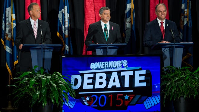 Louisiana Public Service Commissioner Scott Angelle, Lieutenant Governor Jay Dardenne, and State Rep. John Bel Edwards participate in the Governor's Debate held by Louisiana Public Broadcasting at the UL Student Union in Lafayette, La., Wednesday, Oct. 14, 2015. US Senator David Vitter was not present for the debate. 