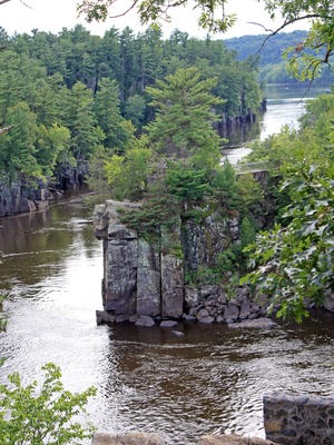 The St. Croix River cuts through a basalt gorge known as the Dalles of the St. Croix in St. Croix Falls. The dramatic rock walls are part of Interstate State Park — both on the Wisconsin and Minnesota sides of the river.