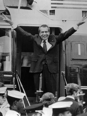 Richard Nixon waves goodbye from the White House on Aug. 9, 1974, after resigning the presidency.