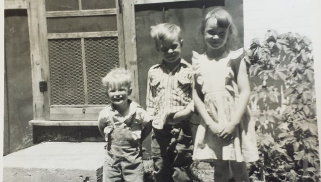 Julie Carter and two of her three brothers (circa 1959).