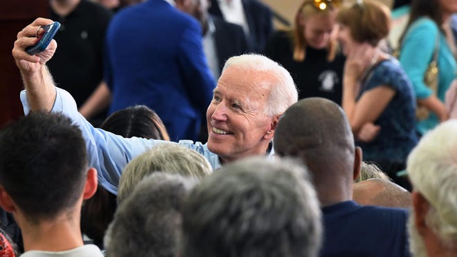 Former Vice President Joe Biden takes photos with supporters following the first rally of his 2020 campaign, Saturday, May 4, 2019 in Columbia, S.C.