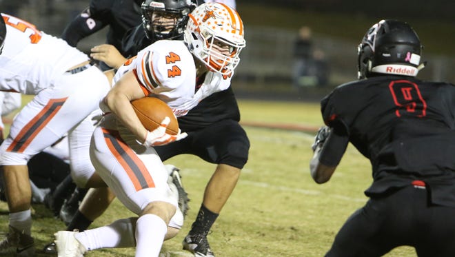 Mauldin’s Thomas Tillotson returns a fumble during the Mavericks’ game against Hillcrest Oct. 27. Tillotson has been selected to play in the Blue-Gray All-American Bowl at 6 p.m. today at AT&T Stadium in Arlington, Texas.