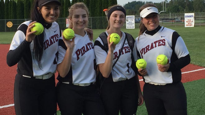 Dayton's Kalina Rojas (from left), Ani Heidt, Haley Couch and Kylee Hill hit home runs against Scio on Tuesday, May 30, 2017.