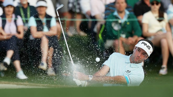 AUGUSTA, GA - APRIL 06:  Bubba Watson of the United States plays a shot from a greenside bunker on the 18th hole during the second round of the 2018 Masters Tournament at Augusta National Golf Club on April 6, 2018 in Augusta, Georgia.  (Photo by Patrick Smith/Getty Images)
