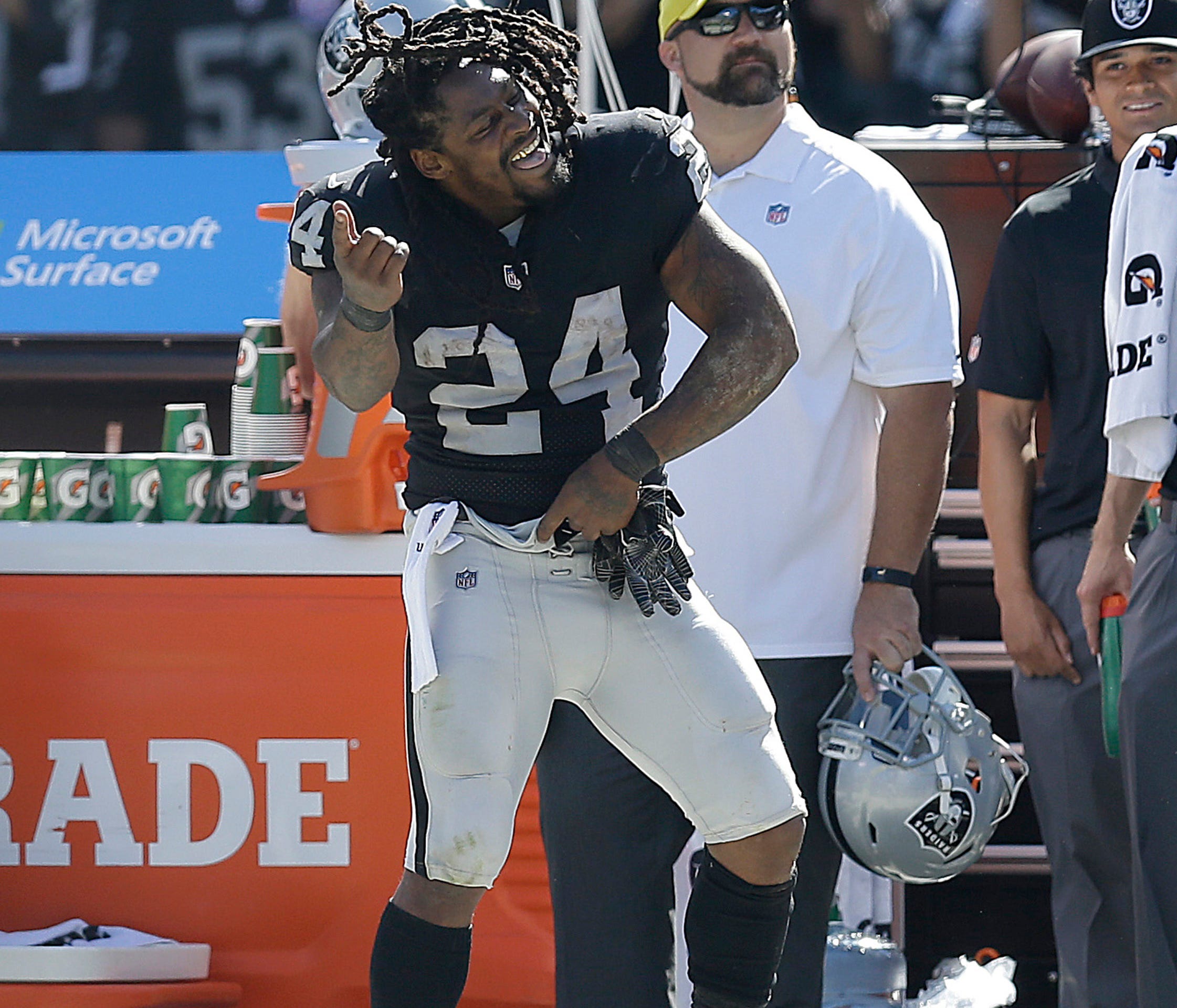 Oakland Raiders running back Marshawn Lynch (24) dances on the sideline during the second half of an NFL football game against the New York Jets in Oakland, Calif., Sunday, Sept. 17, 2017. (AP Photo/Ben Margot)