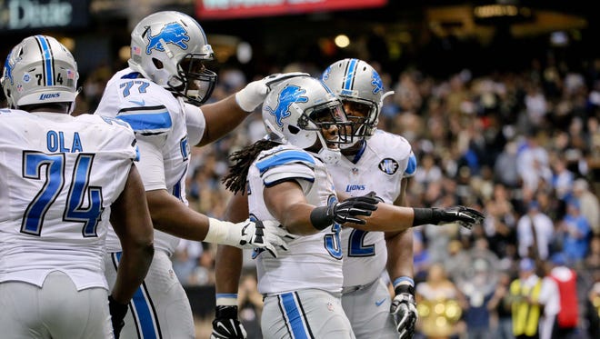 Dec 21, 2015; New Orleans, LA, USA; Detroit Lions running back Joique Bell (35) celebrates after a touchdown against the New Orleans Saints during the second half of a game at the Mercedes-Benz Superdome. The Lions defeated the Saints 35-27.