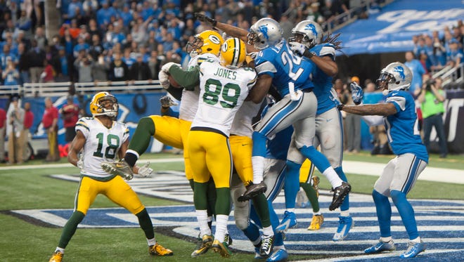 Richard Rodgers makes the Hail Mary catch on a 61-yard pass from Aaron Rodgers to beat the Lions on Dec. 3.
