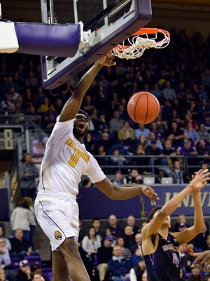 California Golden Bears forward Jaylen Brown (0) dunks the ball against the Washington Huskies during the second half at Alaska Airlines Arena in February.