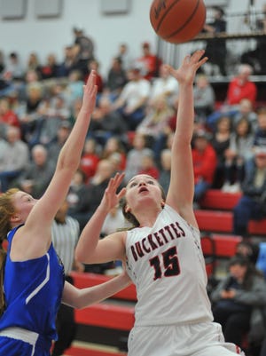 Buckeye Central's Taylor Ratliff pus up a layup with Crestline's Lydia Tadda guarding her.