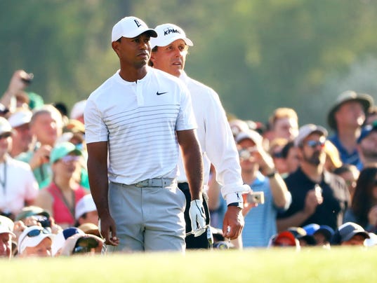 2018-4-3-tiger-woods-phil-back