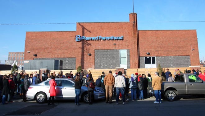 Anti-abortion advocates gathered Feb. 6, 2016, at the Planned Parenthood clinic on South Seventh Street in Louisville.