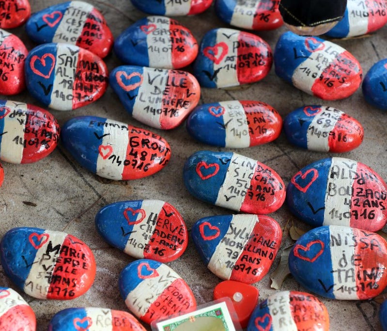 Shingles with the names of victims of the Nice terror attack are displayed in Nice, France, on Feb. 9.   On July 14, a truck smashed into a crowd in the French resort, killing 84 people as they watched a Bastille Day fireworks display.