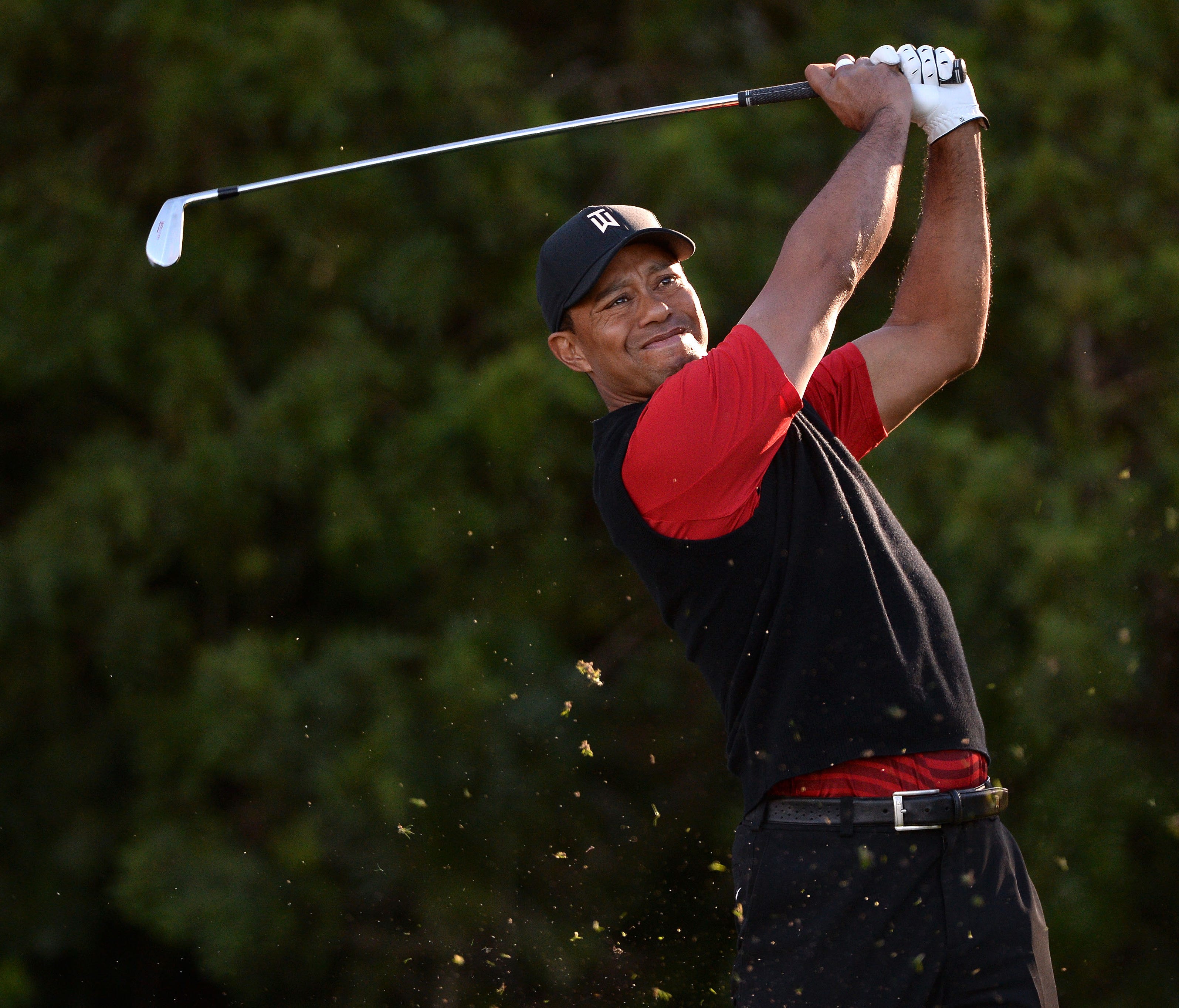 Tiger Woods plays his shot from the 11th tee during the final round of the Farmers Insurance Open at Torrey Pines.