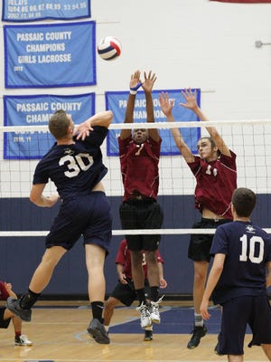 Wayne Valley (in blue), shown battling Bloomfield in the 2016 North 1 boys volleyball semifinals, must overcome graduation losses to defend its North 1 title.