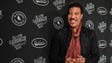 Lionel RIchie poses at the red carpet for the All In
