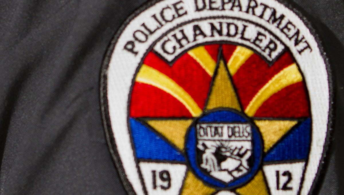 While a girl was apprehended at a protest in Chandler, an SUV that pushed through a crowd at an intersection fled, police said.
