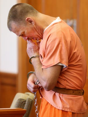 Todd Shaw wipes away tears as a close friend speaks about his character during Thursday's sentencing.