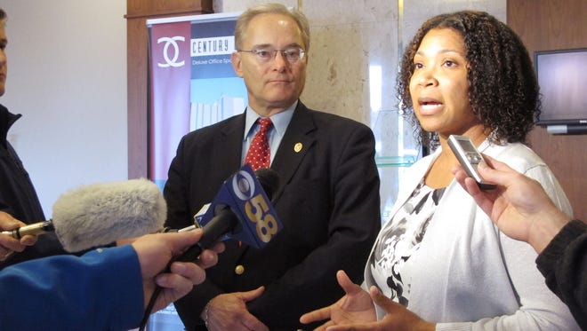 Assembly Democratic Minority Leader Peter Barca, D-Kenosha, left, and state Sen. Nikiya Harris Dodd, D-Milwaukee, speak out Thursday in Milwaukee against a proposal to merge Wisconsin's chief jobs-creation agency with one that hands out low-interest loans for housing.