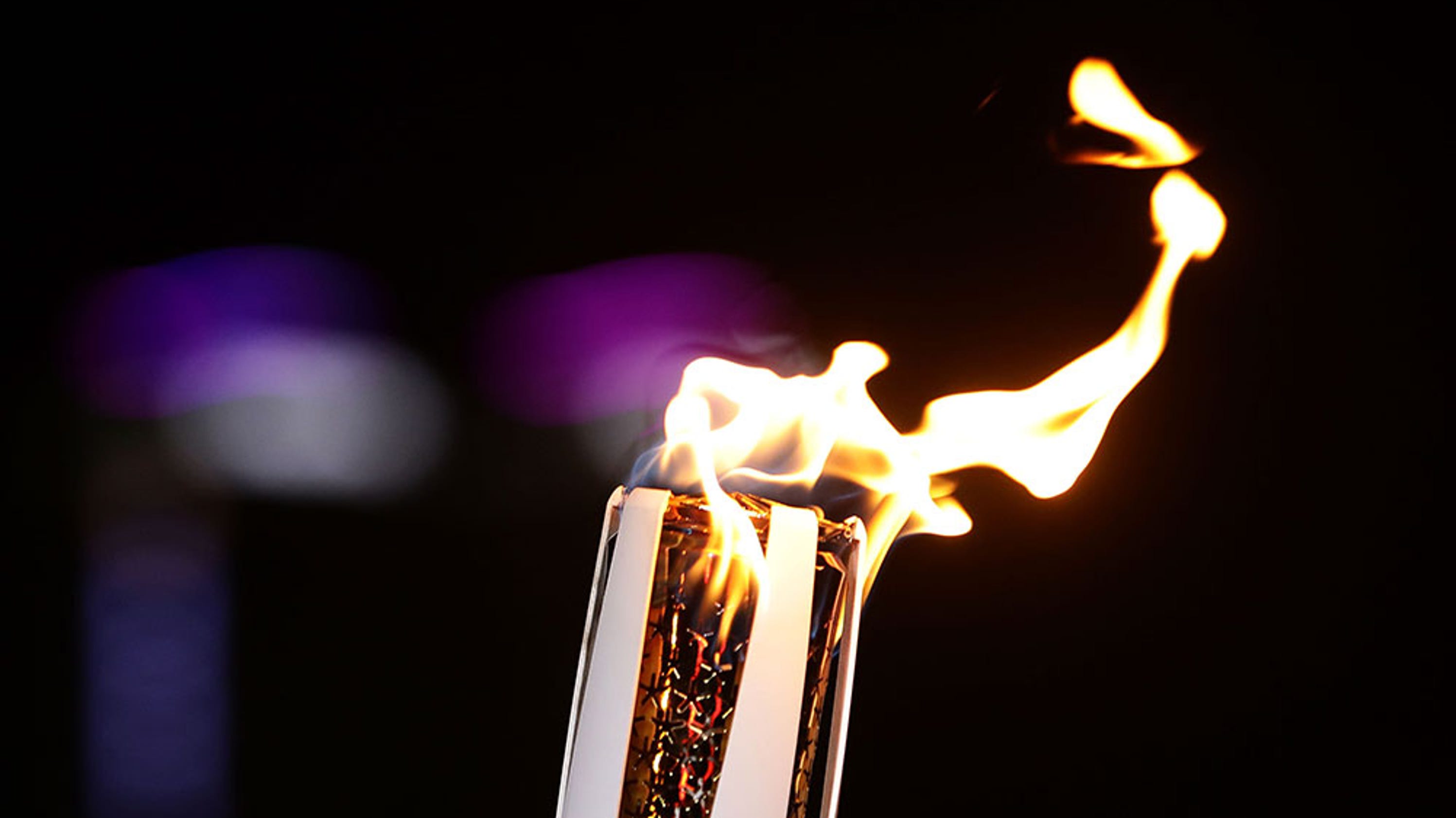Rangers OF carries Olympic torch