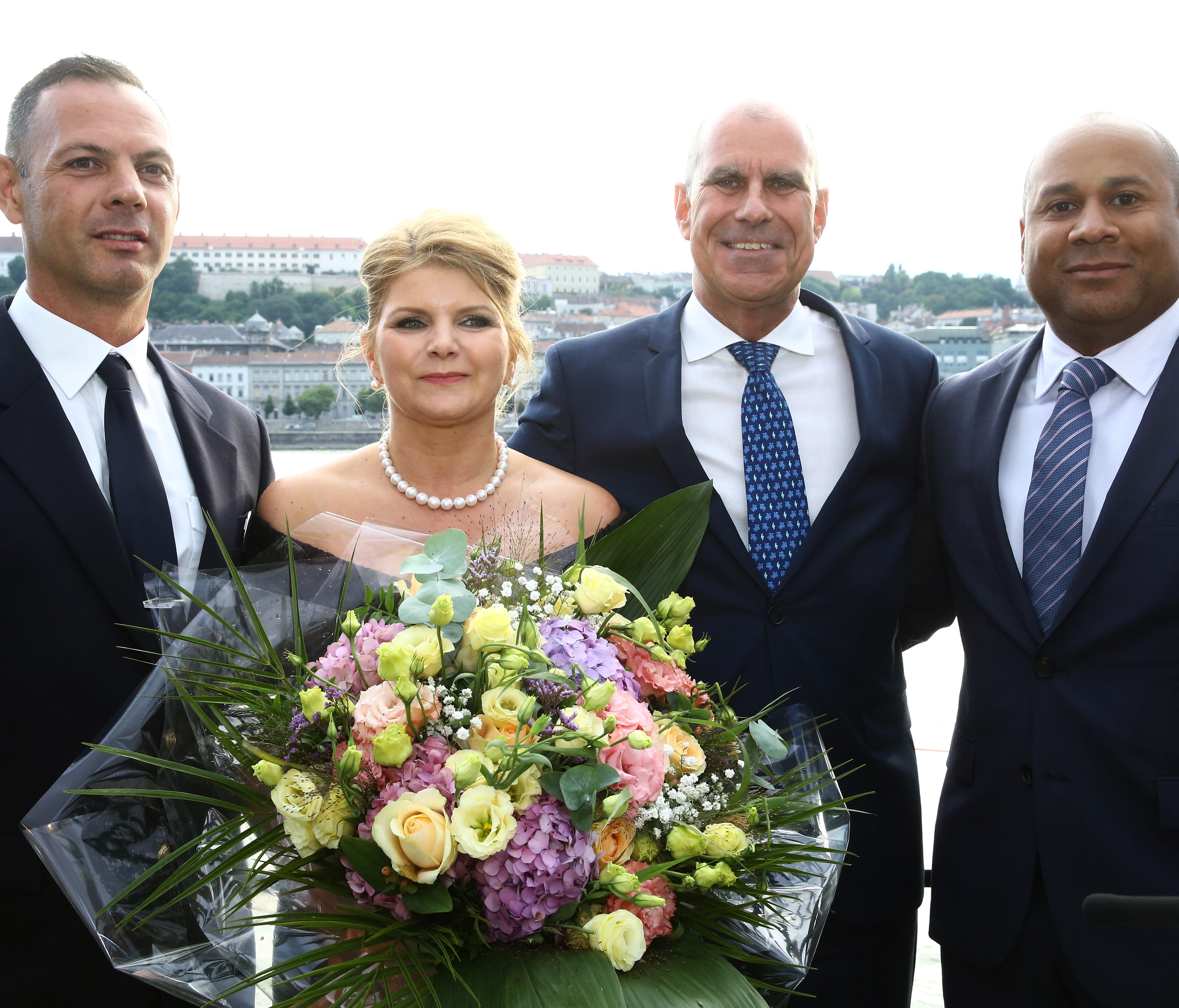 Crystal Ravel godmother Mariann Peller wth Crystal Cruises president and CEO Tom Wolber (center right) and Crystal River Cruises vice president and managing director Walter Littlejohn (right) at the christening of Crystal Ravel.