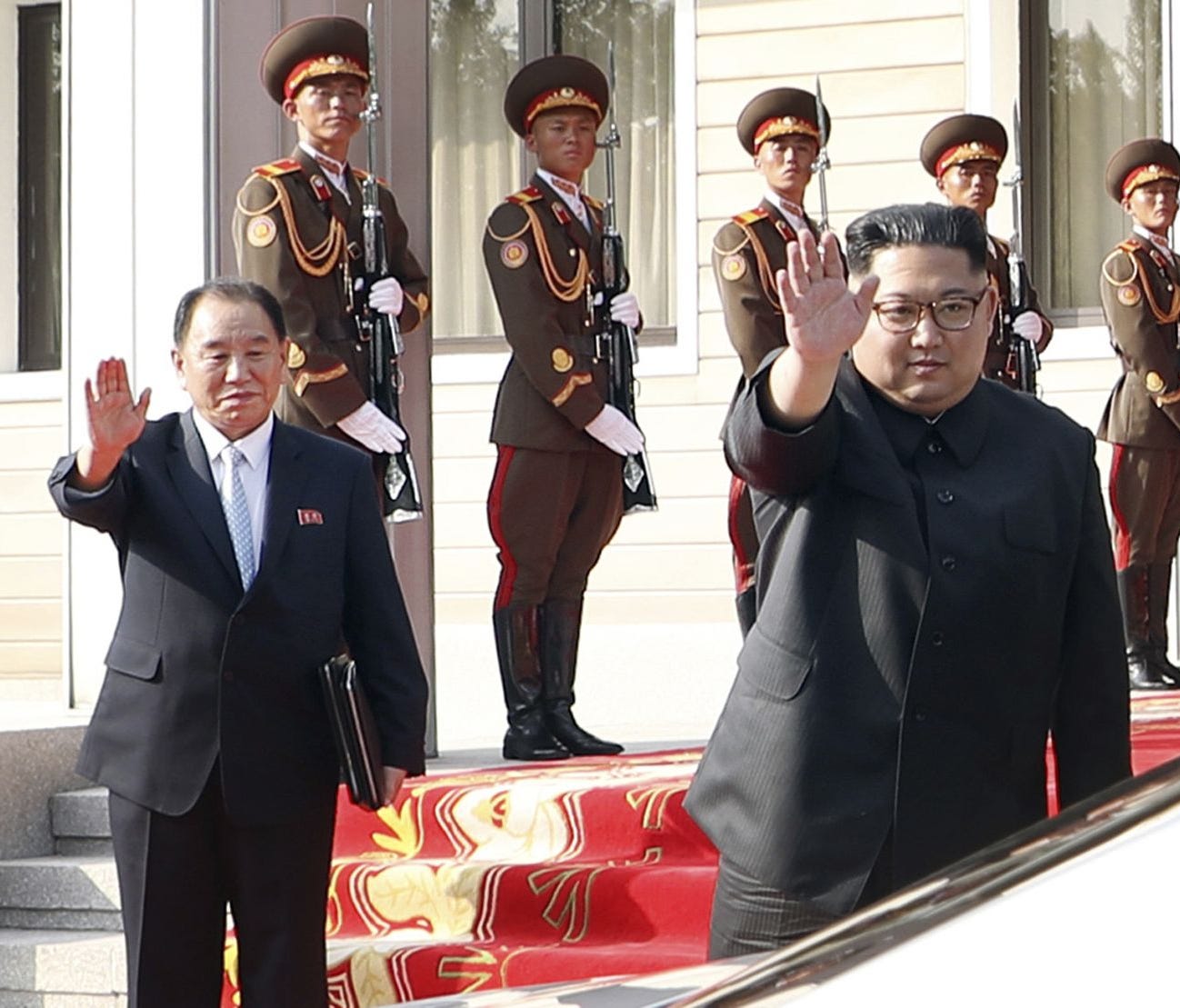 In this May 26, 2018 photo provided May 27, 2018, by South Korea Presidential Blue House via Yonhap News Agency, North Korean leader Kim Jong Un, right, and Kim Yong Chol, a former military intelligence chief who is now a vice chairman of the North K