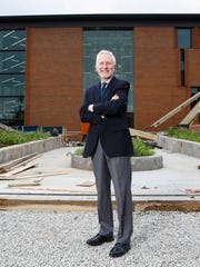 Craig Buthod, president and CEO of the Filson Historical Society, said he's excited to see the progress of the Filson expansion with the new Owsley Brown II History Center, seen in background.