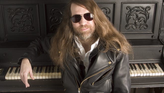 In this Oct. 20, 2006 file photo, Paul O'Neill, of Trans Siberian Orchestra, poses for a portrait in New York. O'Neill, who founded the progressive metal band Trans-Siberian Orchestra that was known for its spectacular holiday concerts filled with theatrics, lasers and pyrotechnics was found dead in his room at a Tampa Embassy Suites.