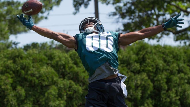 Philadelphia wide receiver Paul Turner (80) catches the ball during mini camp at NovaCare Complex.
