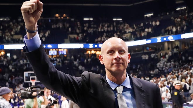 FILE - In this Dec. 2, 2017, file photo, Xavier head coach Chris Mack celebrates after an NCAA college basketball game against Cincinnati, in Cincinnati. The Xavier Musketeers have had a couple days to get used to the idea of being a No. 1 seed for the first time in program history before turning their attention to starting play in the West Region of the NCAA Tournament.  (AP Photo/John Minchillo)