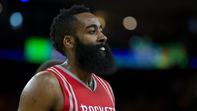 Apr 27, 2016; Oakland, CA, USA; Houston Rockets guard James Harden (13) as a timeout is called against the Golden State Warriors during the third quarter in game five of the first round of the NBA Playoffs at Oracle Arena. Mandatory Credit: Kelley L Cox-USA TODAY Sports