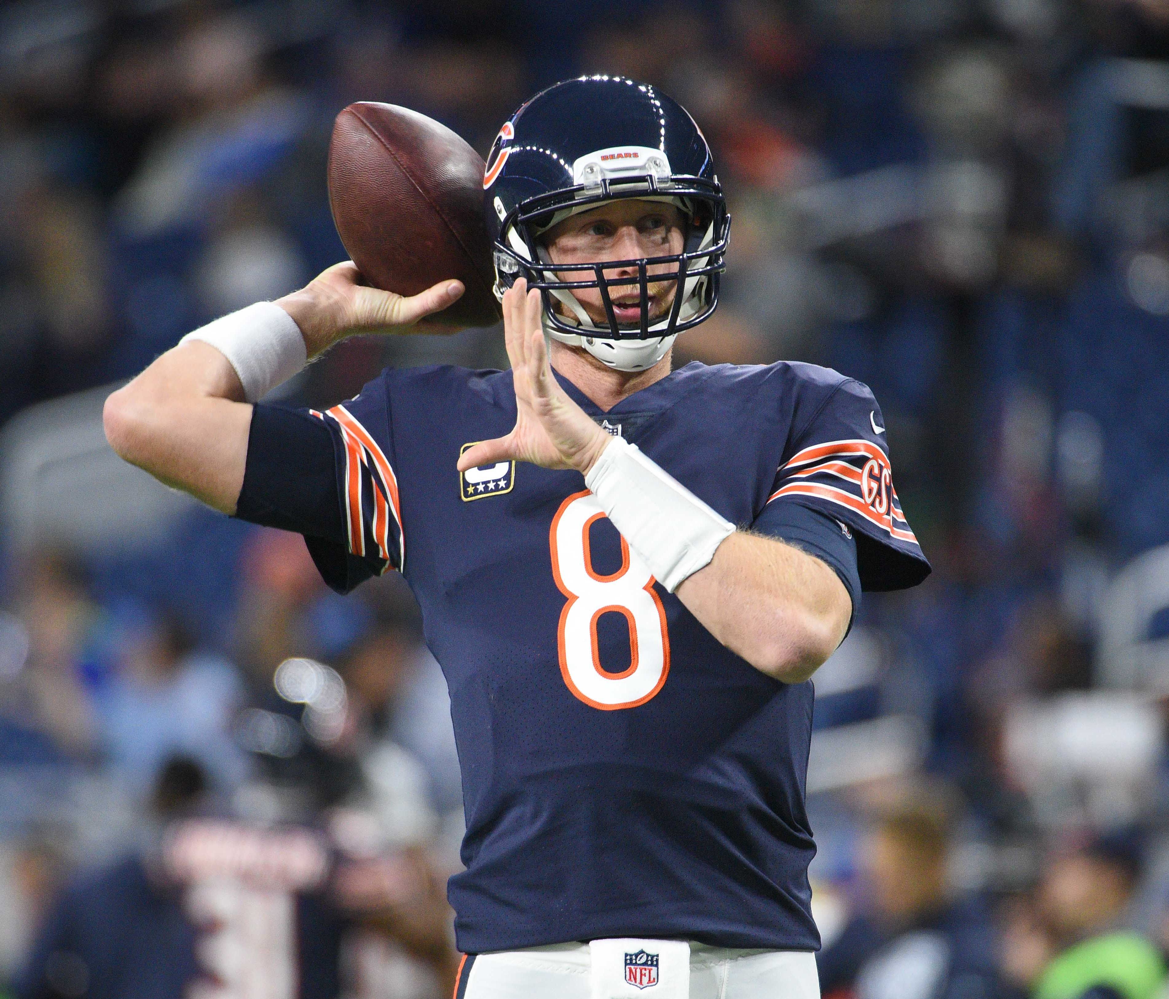 Chicago Bears quarterback Mike Glennon (8) warms up before the game against the Detroit Lions at Ford Field.
