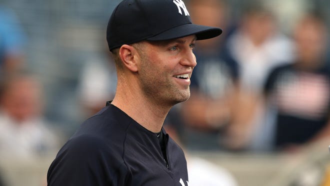New York Yankees' J.A. Happ looks on from the dugout before a baseball game against the Kansas City Royals, Saturday, July 28, 2018, at Yankee Stadium in New York. (AP Photo/Rich Schultz)
