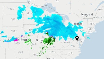 A screenshot of the USA TODAY Weather map shows a major winter storm moving across the Great Lakes region on Sunday, Dec. 11, 2016.