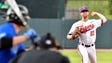 Clemson pitcher Charlie Barnes (23) throws in to the