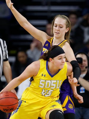 SIOUX FALLS, SD - MARCH 5:  Olivia Braun #3 of Western Illinois defends Ellie Thompson #45 of South Dakota State as she drives to the hoop at the 2018 Summit League Basketball tournament at the Denny Sanford Premier Center in Sioux Falls. (Photo by Dick Carlson/Inertia)
